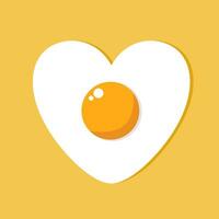 Heart shaped fried egg isolated on orange background. Fried egg icon. Close up fried egg vector