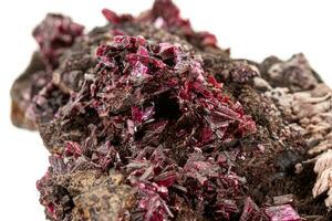 Macro stone Erythrite mineral on white background photo