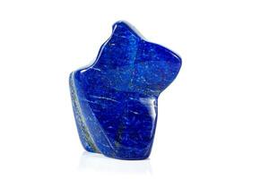 Macro of a mineral stone Lazurite on a white background photo