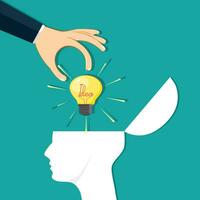 The hand placed a light bulb on the human head. Generating new ideas vector