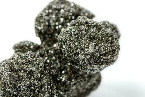 Macro mineral stone chlorite in quartz on a white background photo