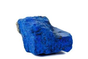 Macro Azurite mineral stone with Pyrite inserts on a white background photo