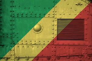 Congo flag depicted on side part of military armored tank closeup. Army forces conceptual background photo