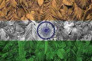 India flag depicted on many leafs of monstera palm trees. Trendy fashionable backdrop photo