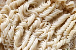 Instant cooking noodles macro texture in boiled condition photo