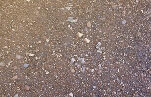 Background of shattered stony stones surface in mountain area. Texture with natural light photo