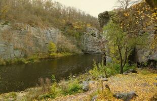 Granite rocks of Bukski Canyon with the Girskyi Tikych River. Picturesque landscape and beautiful place in Ukraine photo
