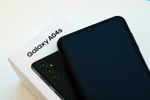 KYIV, UKRAINE - 4 MAY, 2023 Samsung Galaxy A04 Android smartphone has 6.5-inch PLS LCD panel with Infinity-V design photo