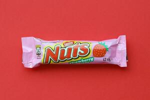 KYIV, UKRAINE - MAY 4, 2022 Nuts original chocolate bar manufactured by Nestle company photo