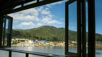Window frame with mountain view video