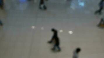 Blur of people moving in department store video