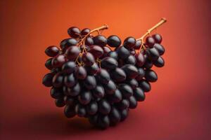 AI generated Bunch of grapes on a red background. Close-up. ai generated photo