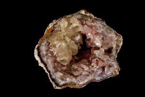 Macro mineral stone Pink Amethyst on a black background photo