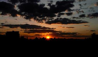 Autumn red sunset with a purple sky photo