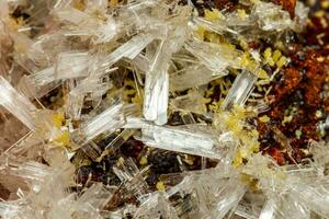 Macro mineral stone crystals Hemimorphite rock on a black background photo