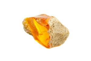 Macro Opal mineral stone in rock on white background photo
