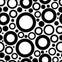 Abstract seamless pattern of circles of different diameters. Vector background. Big and small dots futuristic print