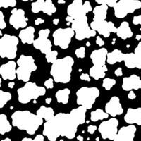 Black and white spotted animal print of Dalmatian or cow. Vector background with animal print. Texture spots and dots of different shapes