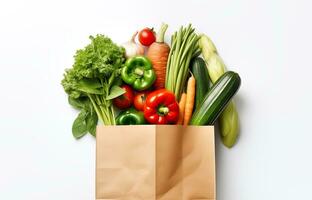 AI Generated Paper bag with fresh vegetables isolated on white background with copy space, top view photo