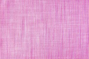 Natural pink linen texture with striped pattern as background, wallpaper. Top view, flat lay photo