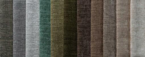 Multi colored set of upholstery fabric samples for selection, collection of textile swatches photo