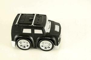 a plastic toy black SUV photo