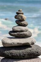 stack of stones on the beach photo