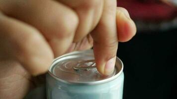 slow motion of opening a soft drinks can . video