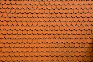 a roof with red tiles photo