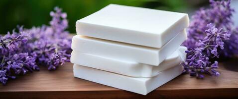 AI generated a stack of white soap blocks arranged on a table with purple flowers photo