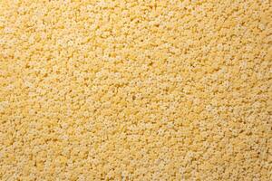 Uncooked Stelline Pasta. A Culinary Canvas of Stelline Macaroni, Creating a Lively and Textured Background for Gourmet Cooking. Dry Pasta. Raw Macaroni - Top View, Flat Lay photo