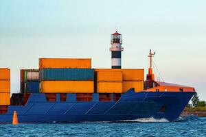 Blue container ship. Global logistics and merchandise transfer photo