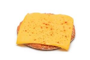 Crispy Cracker Sandwich with Cheese and Paprika Isolated on White photo