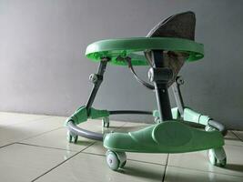 green baby stroller aids for walking photo