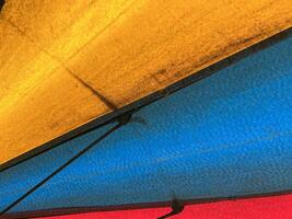 close up multicolored umbrella texture. photo