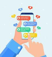 Hand holds smartphone. Online chat messages text notification on mobile phone. Icons, text messages, messages, notifications fly out of the screen. Vector illustration in flat style