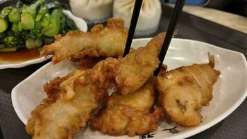 Fried Delicacies Picked with Chopsticks Close Up video