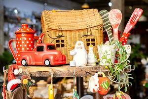 Christmas pottery ceramic on shelve in small craft store. photo