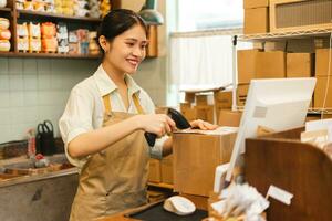 Portrait of Asian woman working in a plant shop photo