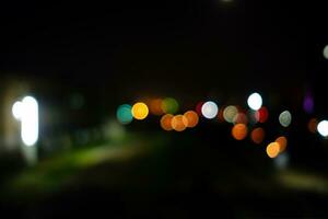 Abstract Colorful Bokeh on the Road Background. photo