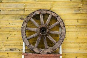 Rustic Wooden Wagon Wheel, Antique Farmhouse Decor, Vintage Cart Artifact photo