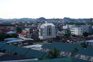 Samarinda Kalimantan Timur, Indonesia 12 December 2023. You can see the atmosphere of housing in the city of Samarinda, East Kalimantan. Photo taken from the top of the building