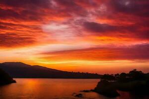 ai generado un rojo cielo terminado un lago con montañas en el antecedentes foto