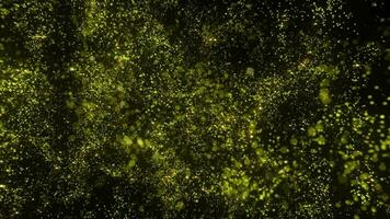 Liquid glitter. Glowing yellow particles. The background. New Year video