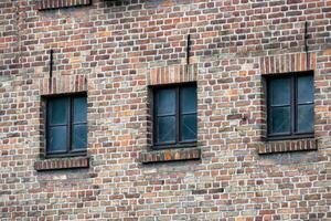 old castle wall with windows photo