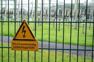 electrical power plant with danger sign photo