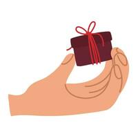 Presentation of a gift. A hand with a small gift box for a banner, the Internet. A gift in your hand. Vector illustration of a flat style. Fingers holding a box with a bow, a thread