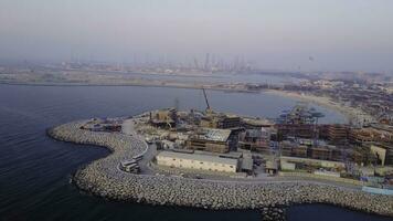 Aerial view of Dubai seaport United Arab Emirates . Top view of the construction of a water port in Dubai photo