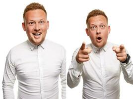 Studio portrait of young handsome smiling and surprised man photo