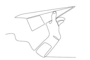 A hand prepares to fly the paper plane vector